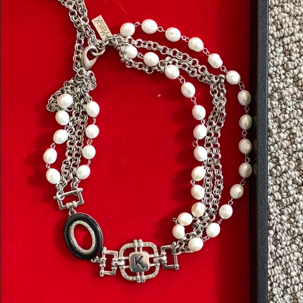 Silver necklace with faux pearls/ worn once